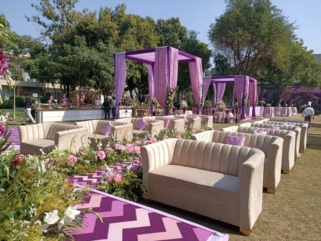 Outdoor wedding venue at Rigveda Palace Faridabad with spacious lawn and floral décor
