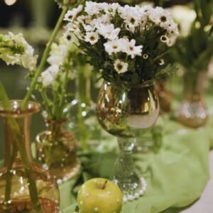 Corporate event setup at Devam Greens in Gurgaon with stage and seating arrangement.