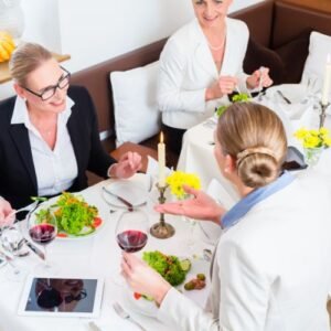 Open-air community gathering at farmhouse with pool in Gurgaon.